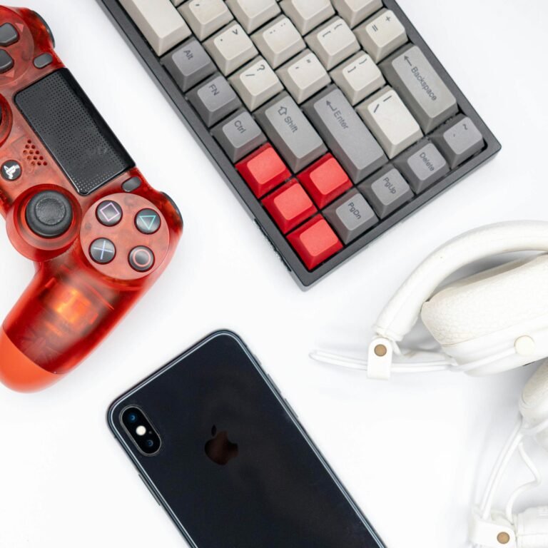 Keyboard with smartphone gamepad and headphones